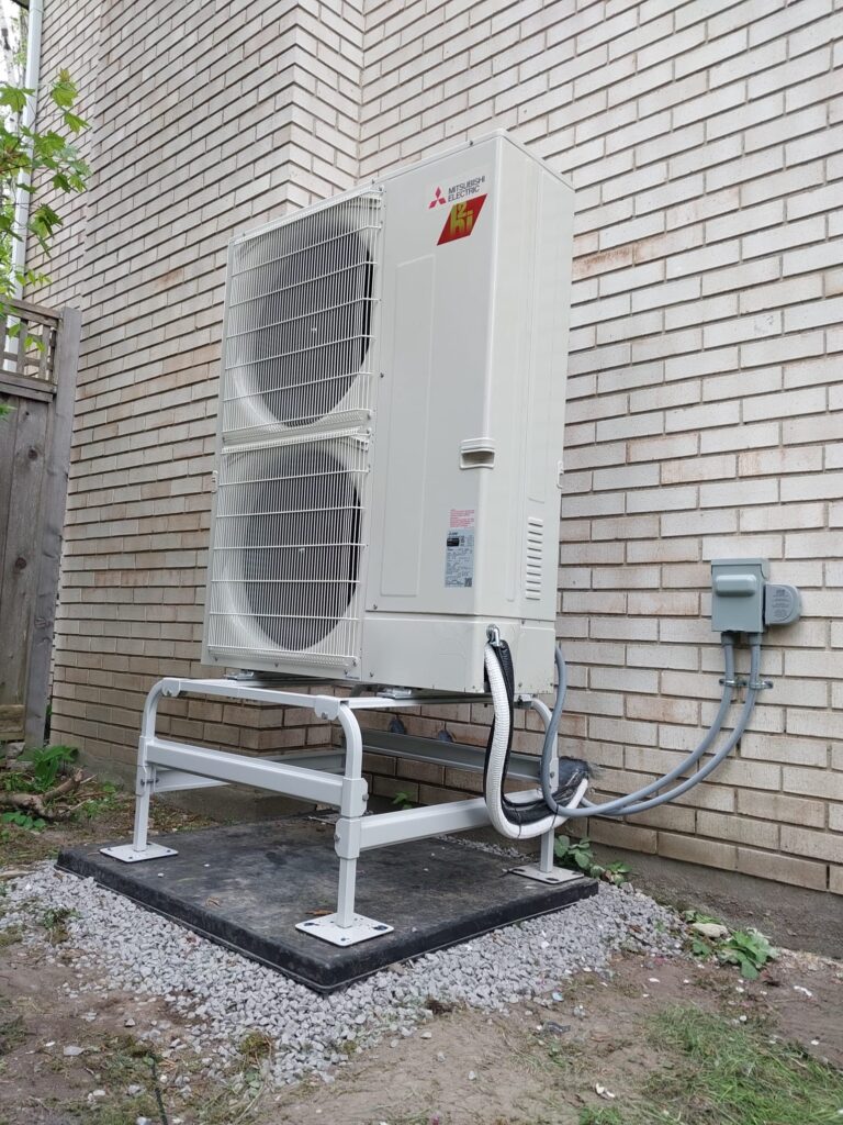 Outdoor Mitsubishi ZUBA Heat Pump installed in Ottawa, Ontario by heating and cooling contractor AirZone HVAC Services.